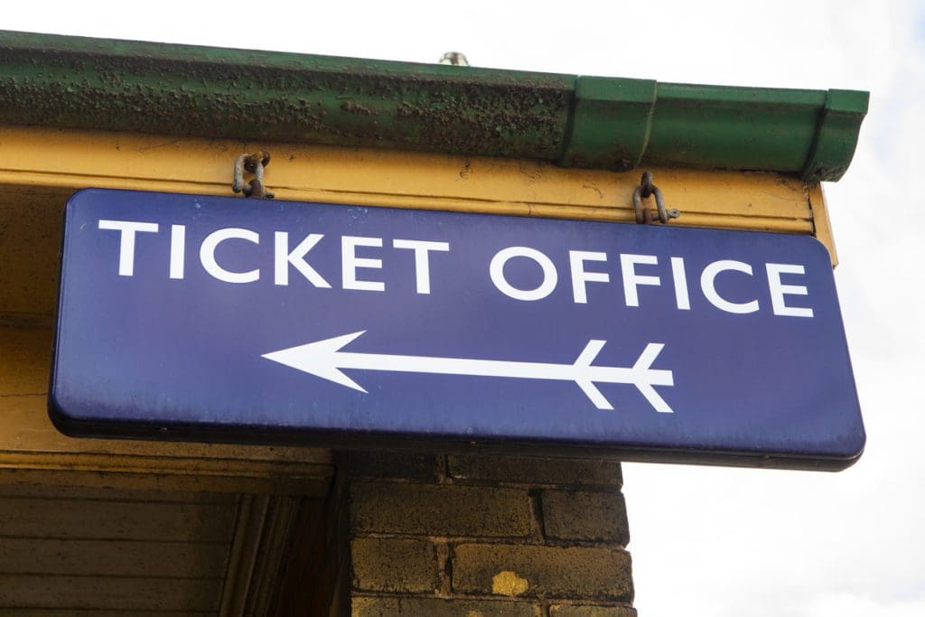 A sign for a ticket office.